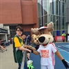 Maplewood HS students shaking mascots’ hand at stadium