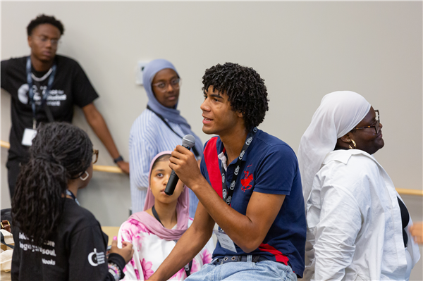 Image of student talking through microphone