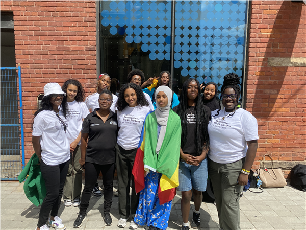 TDSB students and staff pose for a photo at the Emancipation Day event