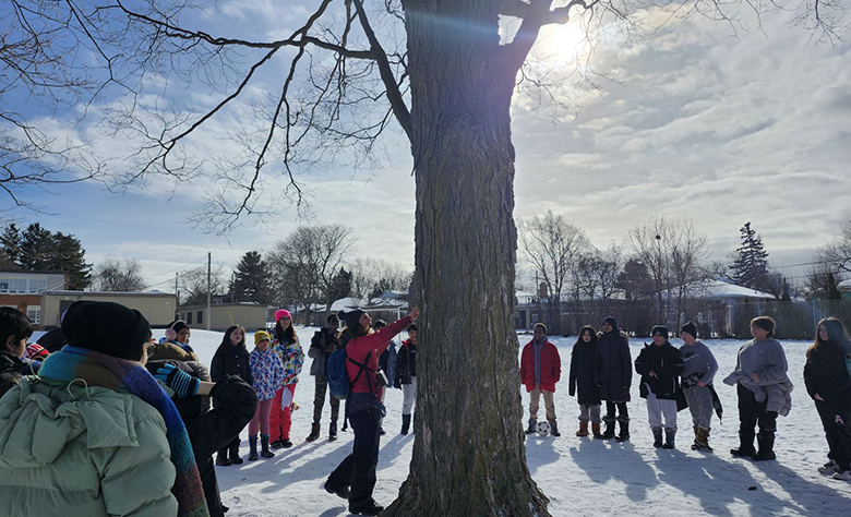 Students at Anson Park PS get hands on learning about maple tree tapping.