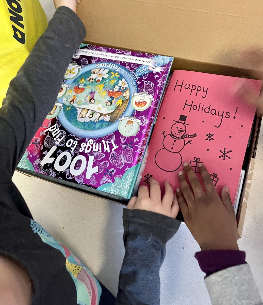 Students from Clairlea PS filling Love Boxes with goodies and handwritten cards this holiday season.