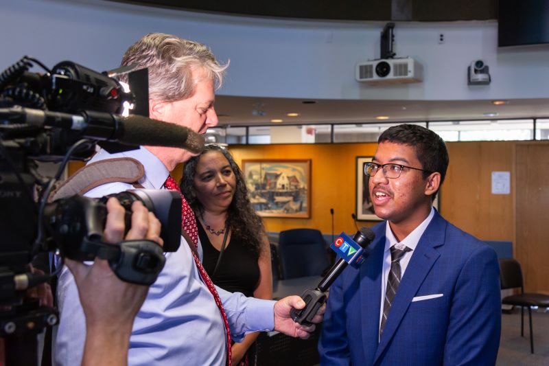 TDSB Top Scholar Hari Pillai being interview by the media about his accomplishment.