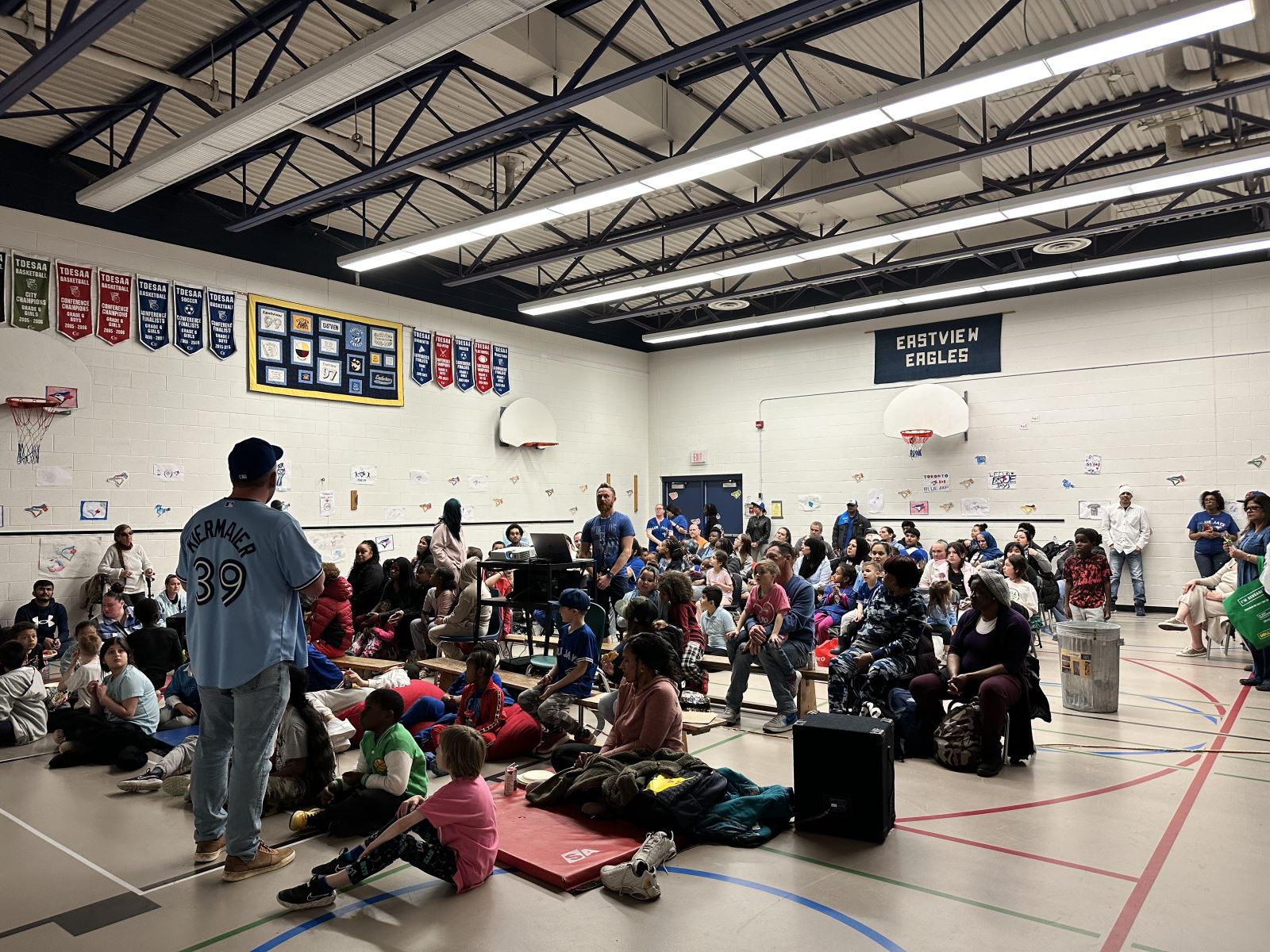 Staff and students gather at Eastview PS awaiting the announcement of the Field of Dreams grant from the Jays Care Foundation.