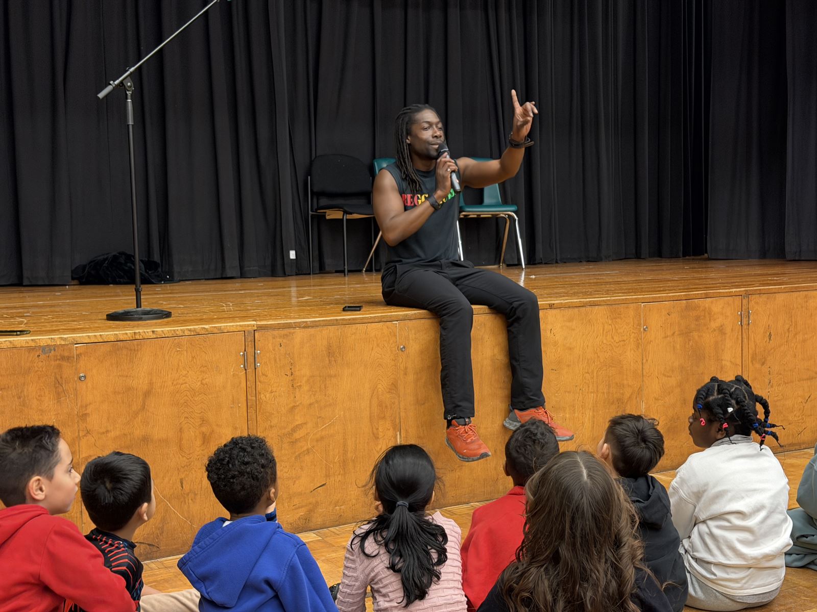 Kevin Carrington speaking with students.