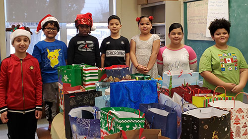 Picture of students with presents