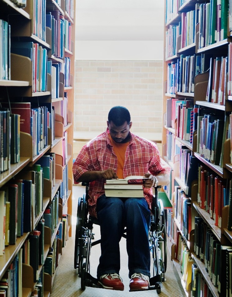 Wheelchair user in Library