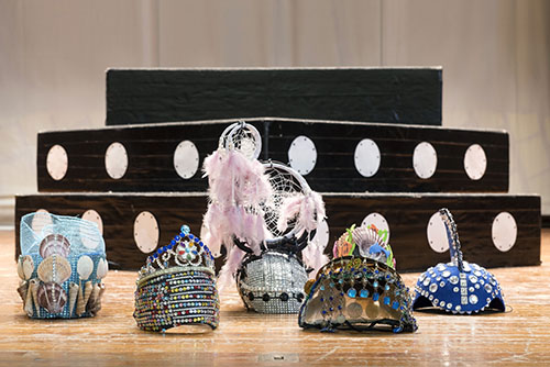 A variety of the headwear worn in the production.