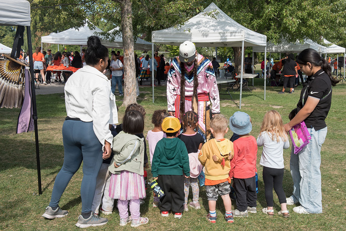 Students gathered in group engaged by presenter