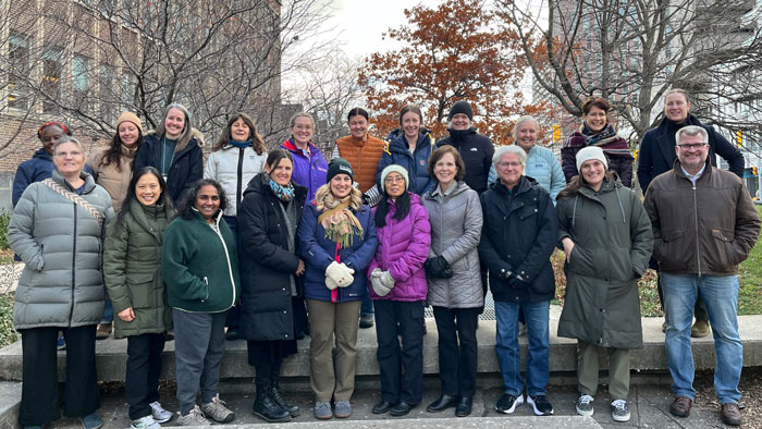 group picture of the Action Reseach team, in a park beside OISE